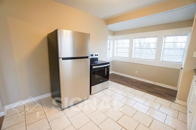 Building Photo - 1932 Portage Ave