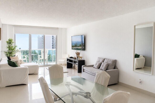 Building Photo - 19370 Collins Ave