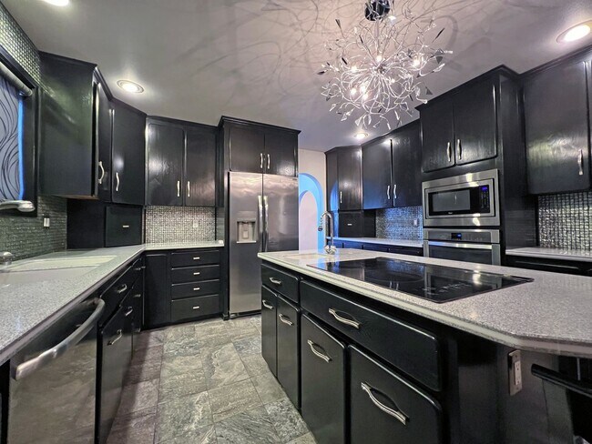 Building Photo - Stunning 4 Bedroom 2.5 Bath with Peek-a-Boo View of Puget Sound