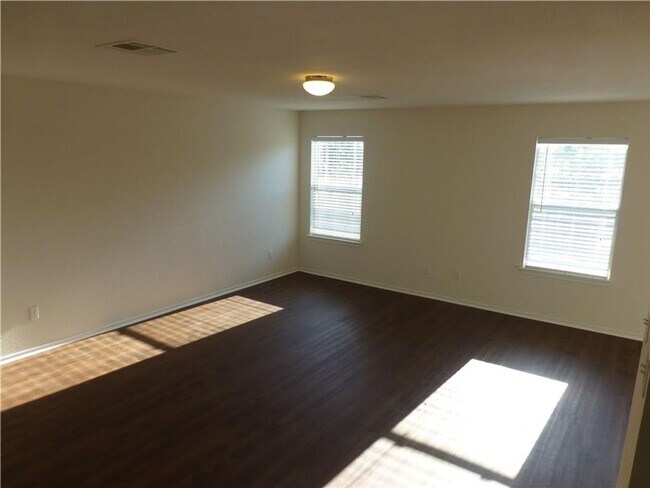 Building Photo - Generous Four Bedroom, Three Bath Home with Large Yard