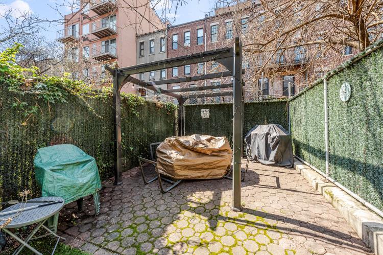 Backyard patio - 130 W 132nd St