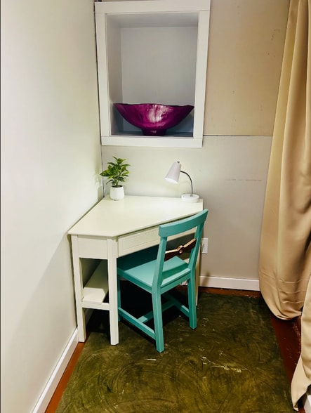 Dedicated desk and workspace separated from bedroom. - 4115 SE Gladstone St