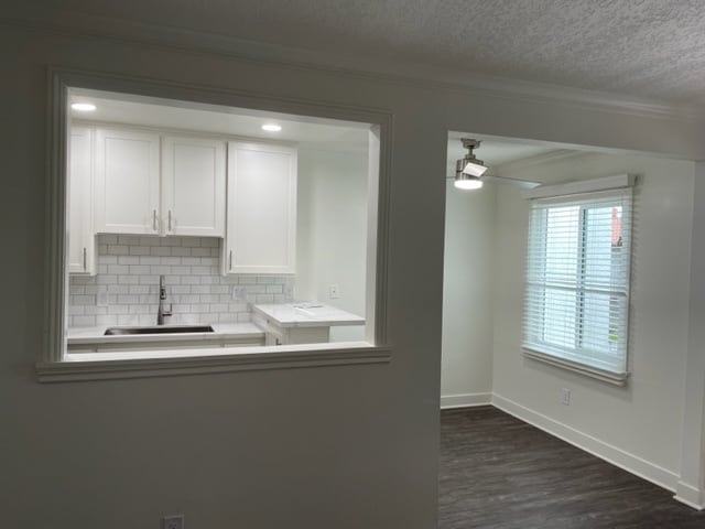 open cutout from kitchen to living room area - 20904 Bloomfield Ave