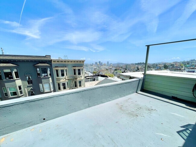 Building Photo - Bright and Airy 2 Bedroom Penthouse in the...