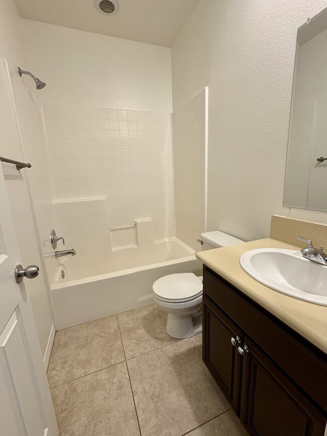 Building Photo - Tri-Level Condo within Walking Distance to...