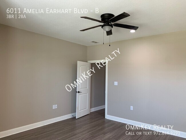 Building Photo - 6011 Amelia Earhart Blvd