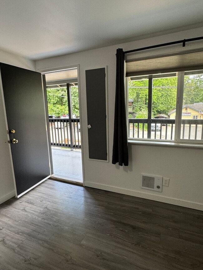 Building Photo - Spacious Two Story (2BR/1BA) Home with Large Fenced-In Yard