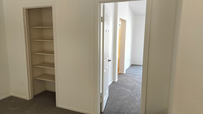 Building Photo - Townhome with Loft + Two Bedrooms/Baths - Designed for Comfort in Gated Community