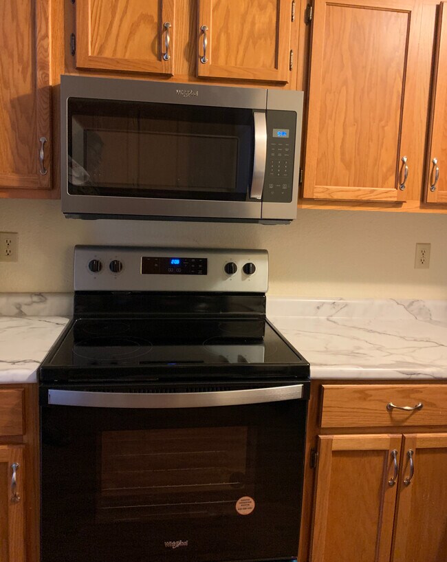 Brand New Stainless Steel Microwave and Oven - 604 NE Douglas St