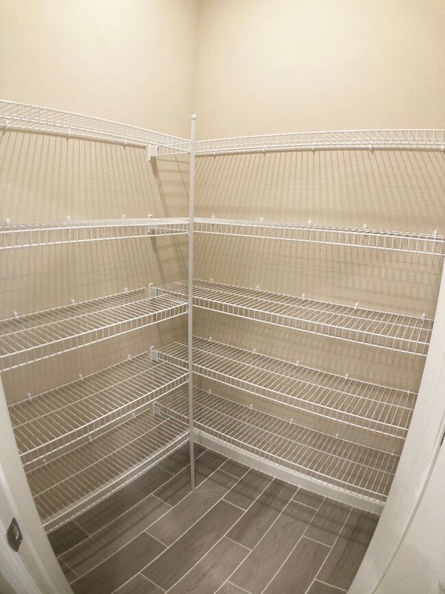 Building Photo - Your Private Escape with High-End Finishes...