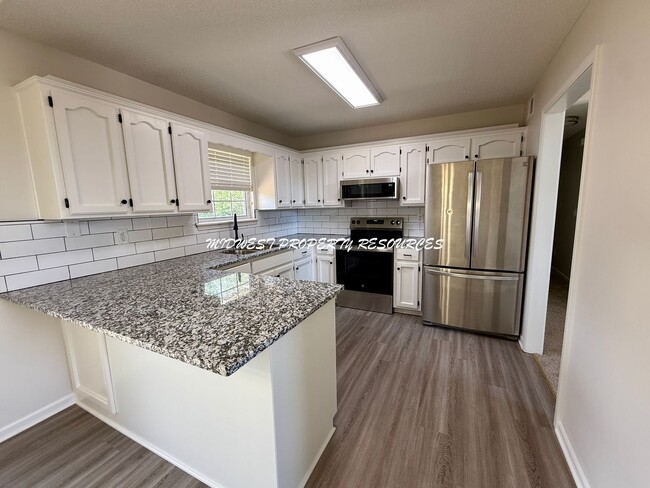 Building Photo - Beautifully Updated 3 Bed, 2 Bath Split-Level Home with Finished Basement