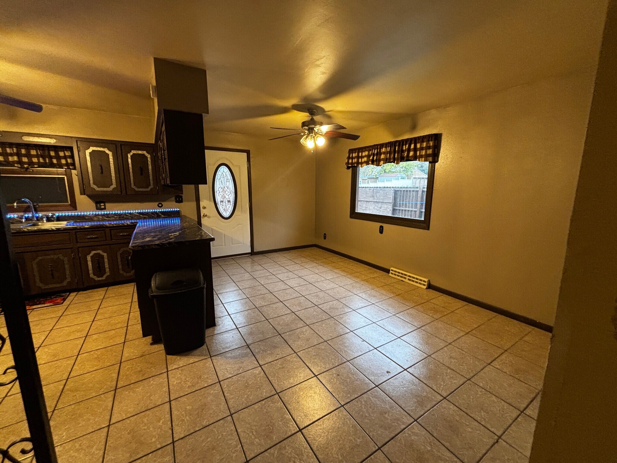 Dining room looking at back deck door - 829 W 5th Ave