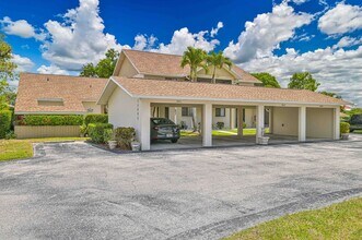 Building Photo - NOW AVAILABLE - Furnished Villa in Riverbend! *Boaters Welcome!*