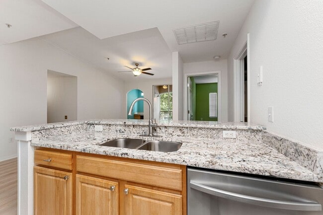 Building Photo - IMMACULATE 2nd Story condominium with so m...