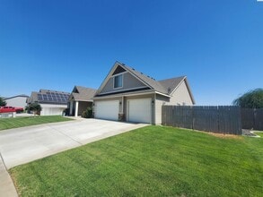 Building Photo - FOR RENT: West Pasco with heated inground ...