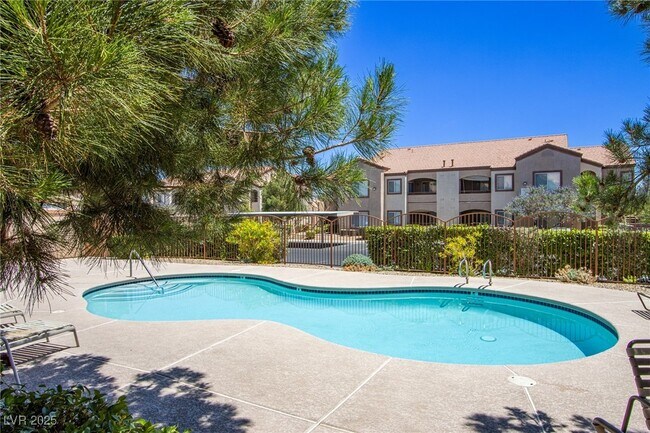 Building Photo - 9580 W Reno Ave