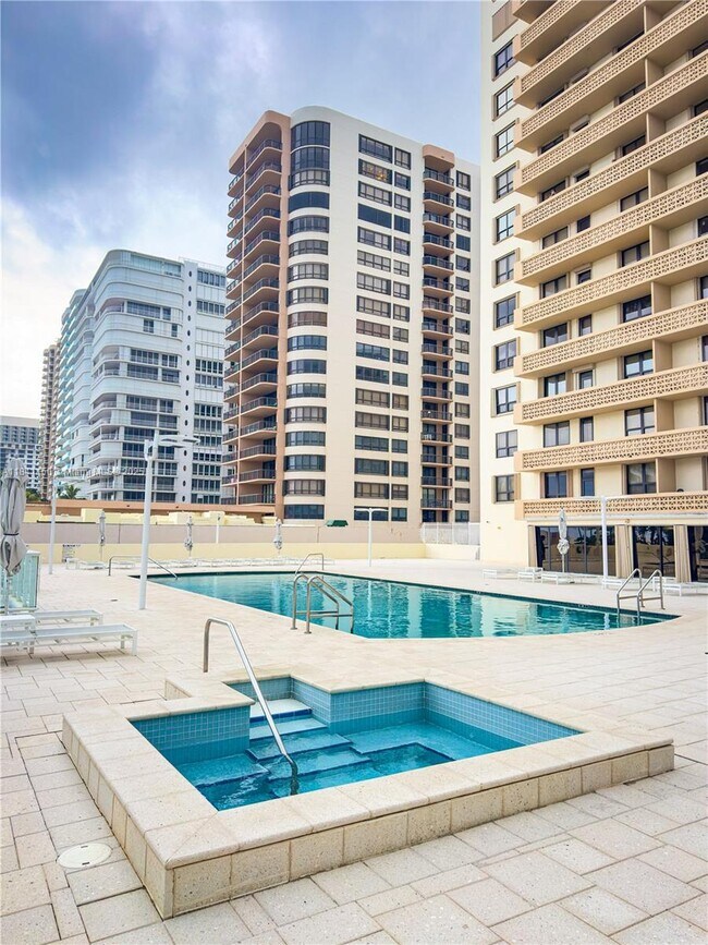 Building Photo - 10185 Collins Ave