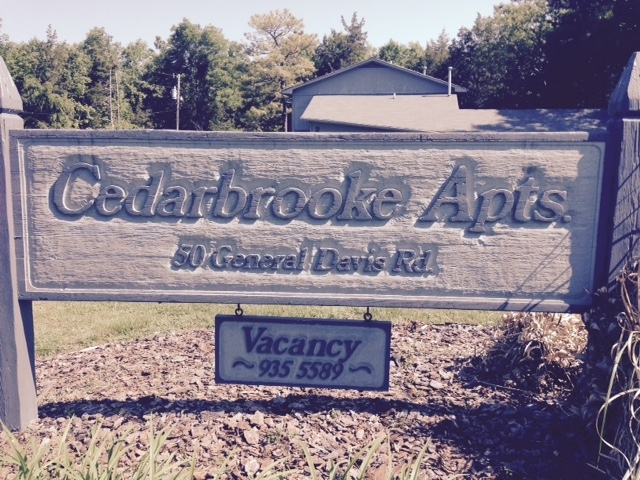 Main sign - Cedarbrooke Apartments