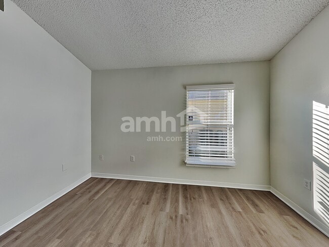 Building Photo - 7251 Lawn Tennis Ln