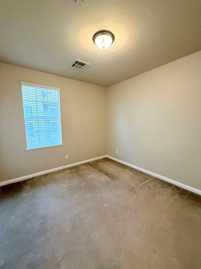 Building Photo - 1865 Wind Ranch Rd