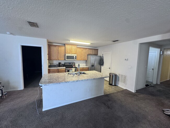 Building Photo - 15373 Bareback Dr