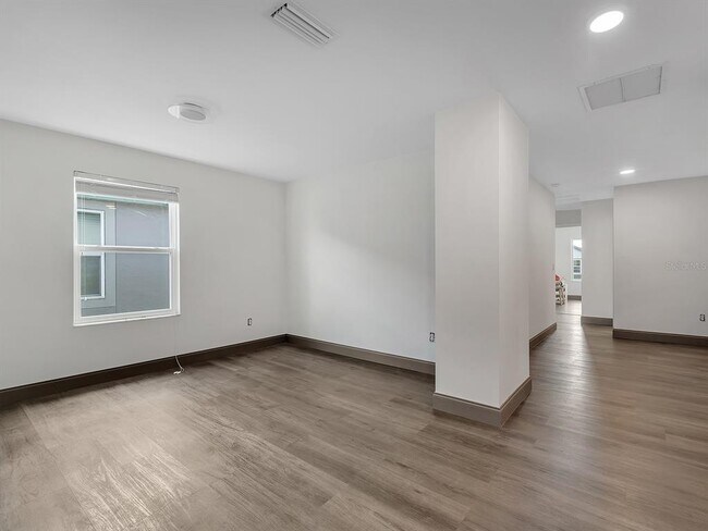 Building Photo - 7323 Pool Compass Loop