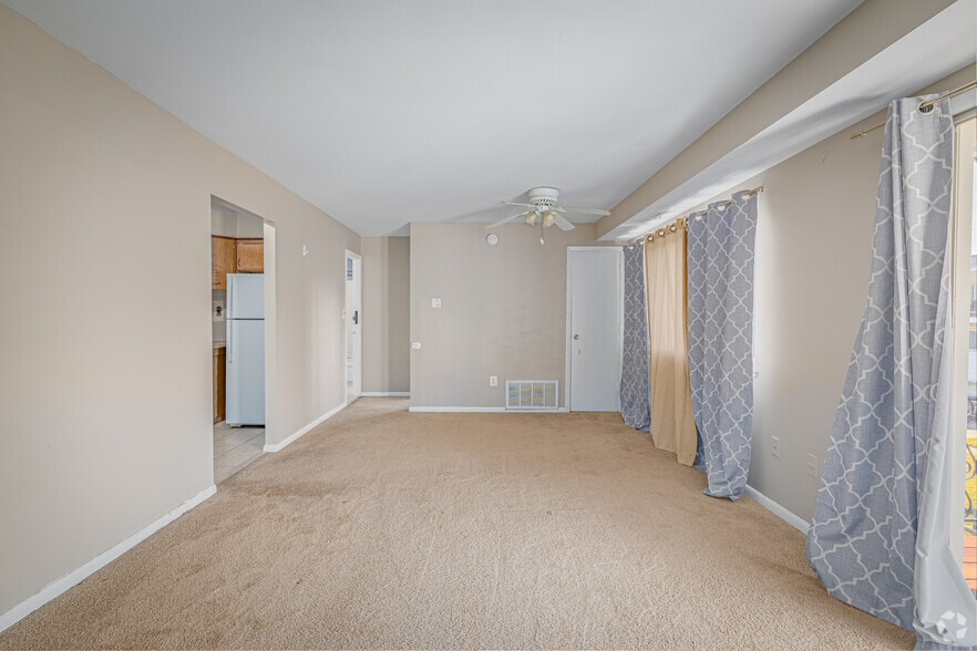 1BR, 1BA - Living and Dining Room - Maiden Choice Apartments