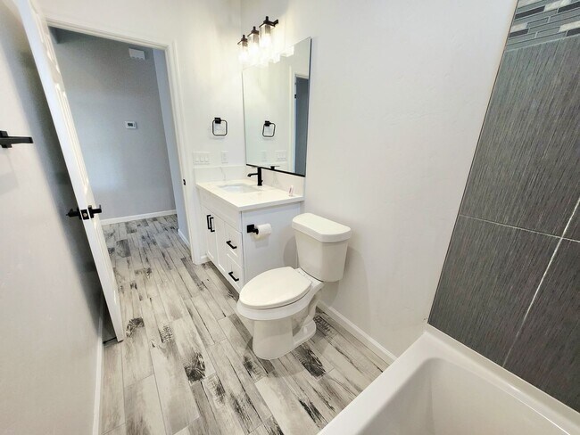 Building Photo - BRAND NEW 3/2 BATH home available for rent in Central BHC.