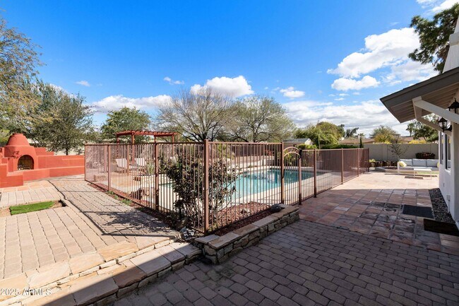 Building Photo - 7074 E Aster Dr