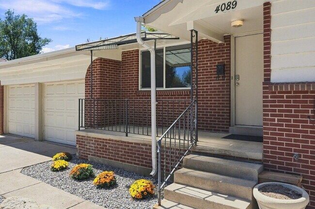 Building Photo - AVAILABLE NOW  Spacious 4-Bedroom Wheat Ridge Home with Finished Garden Level, Two-Car Garage & B...