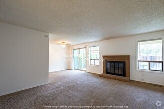 Building Photo - Charming Two-Bedroom Duplex in Aloha—Your ...