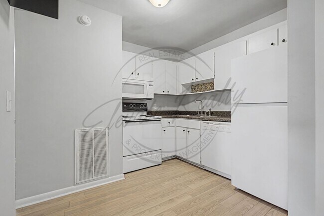 Building Photo - SPRING SPECIAL!! FIRST MONTH FREE on this Two Bedroom Condo, Second Floor, across from Madison Pa...