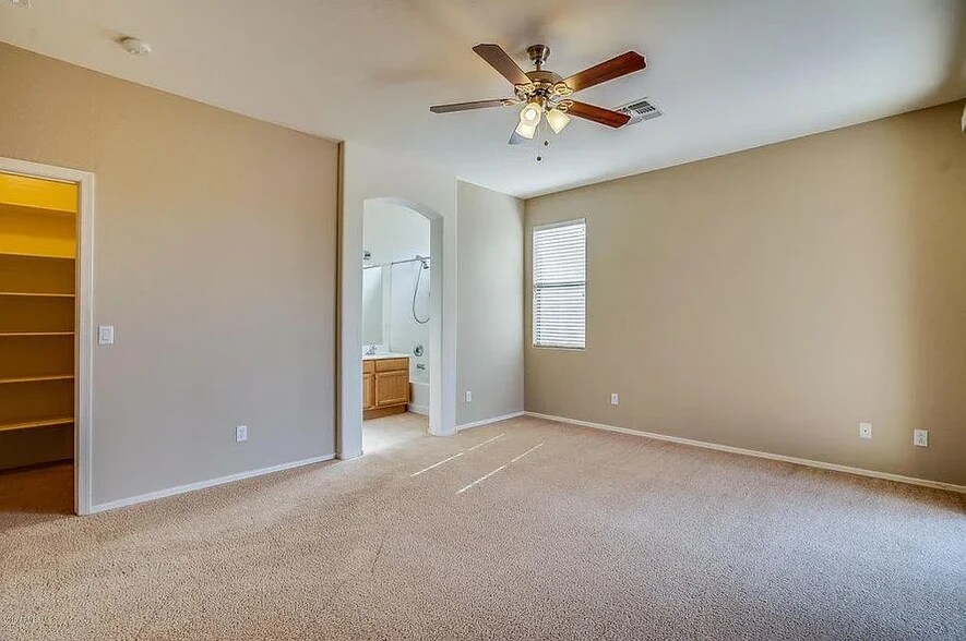 Master bedroom with bathroom - 3470 E Riopelle Ave