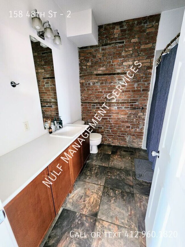 Building Photo - 158 48th St