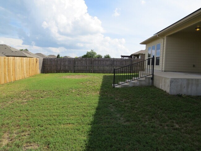 Building Photo - "Charming 4-Bed Oasis with Granite Touches...