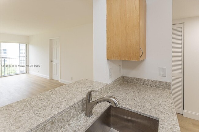 Building Photo - $2,100MONTHLY;8740 N SHERMAN CIR. #408 MIR...