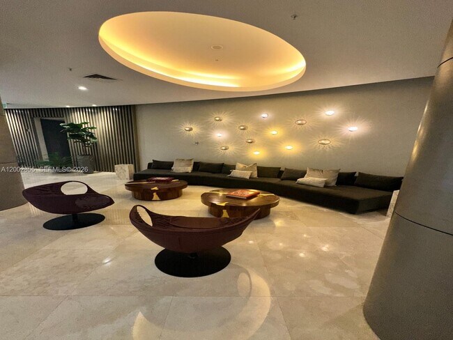 Building Photo - 10275 Collins Ave