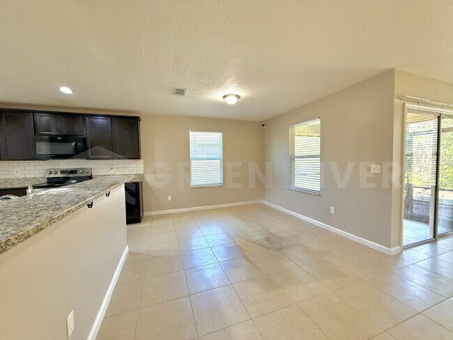 Building Photo - Room to Live, Space to Thrive! Stunning 6BR Home with Solar, Upgrades & Screened Lanai in Macclen...