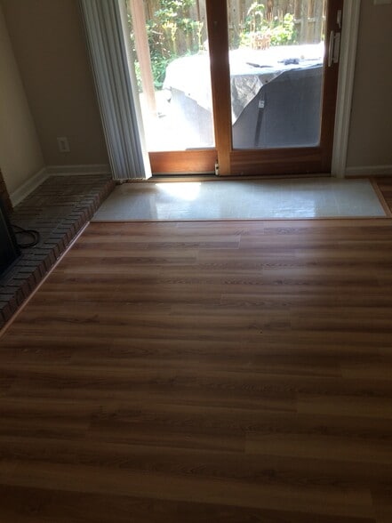 Wood vinyl flooring - 19628 Club Lake Rd