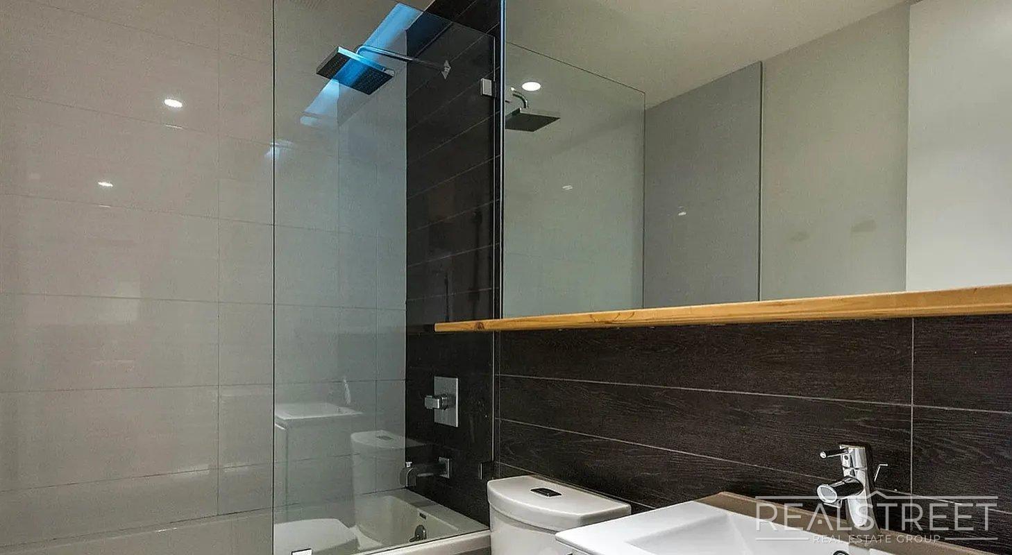 Building Photo - Bright 2 Bed / 1 Bath Loft-Style Residence with Multiple Balconies & Premium Amenities
