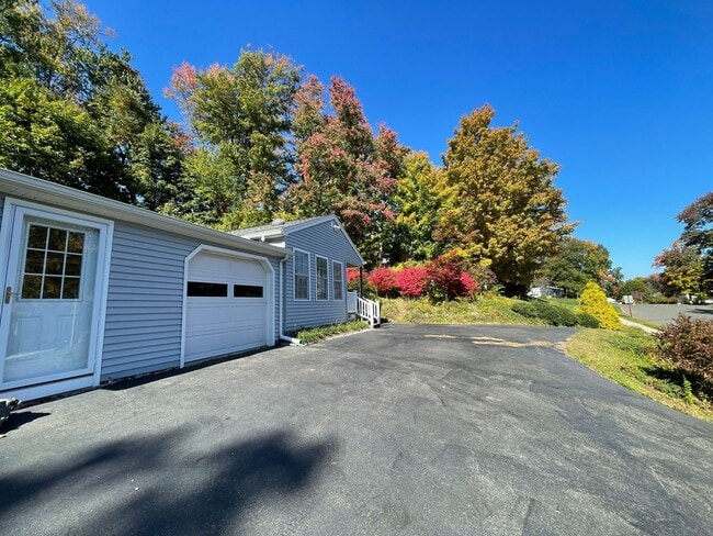 Building Photo - Beautiful 4 Bedroom House *w/ an In-Law* in Cheshire! Garage Parking, Central Air, & a Beautiful ...