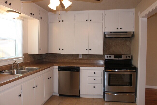 Building Photo - PRE -LEASING FOR AUGUST ! Spacious 4 Bedroom/2 Bath House