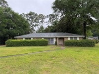 Building Photo - 5855 Woodvale Dr