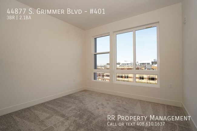 Building Photo - Brand New Top Floor Condo in Excellent Fre...