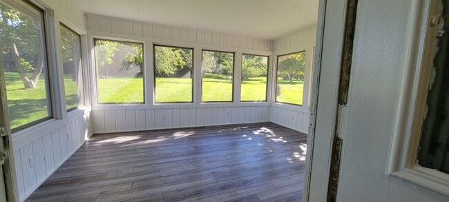 Building Photo - Beautiful home with peek a boo views of West Bay on Old Mission Peninsula