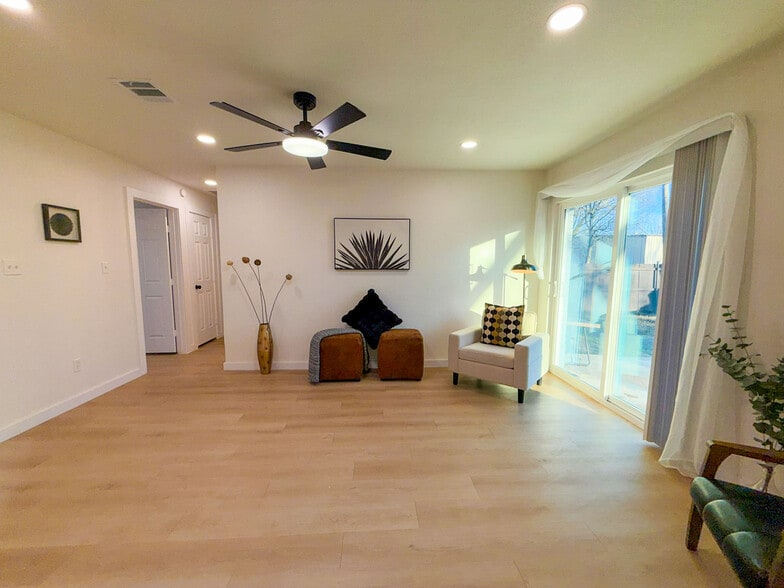 Close up view of the living room with gorgeous flooring throughout the home. - 308 E Bourn St