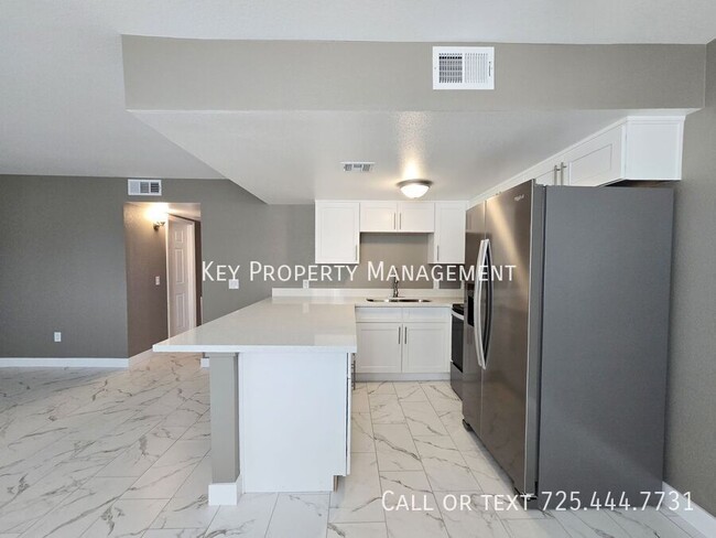 Building Photo - COMPLETELY REMODELED 2BR 1BA CONDO IN N LA...