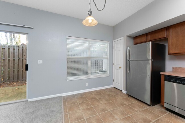 Building Photo - Charming 3BR Townhouse with Garage & Priva...
