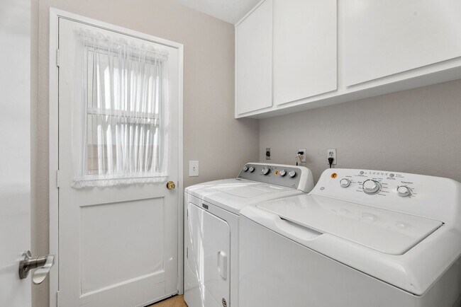 Building Photo - Coastal Elegance Meets Family Comfort in D...