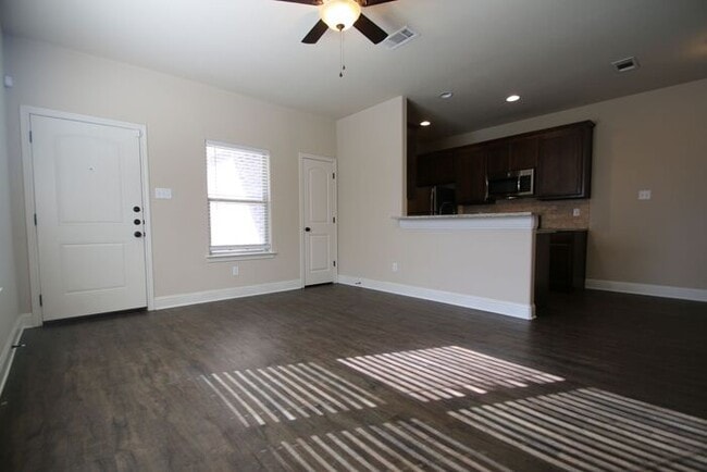 Building Photo - Beautifully Upgraded 3/2 Duplex w/ Garage & Fenced Yard | Off Camp Bowie!